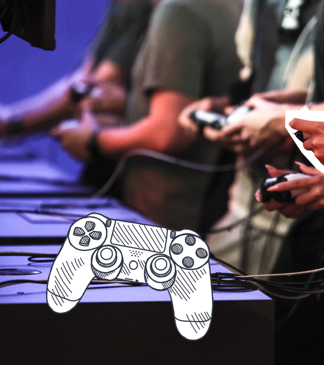 Personen mit Spielkonsole an Computern