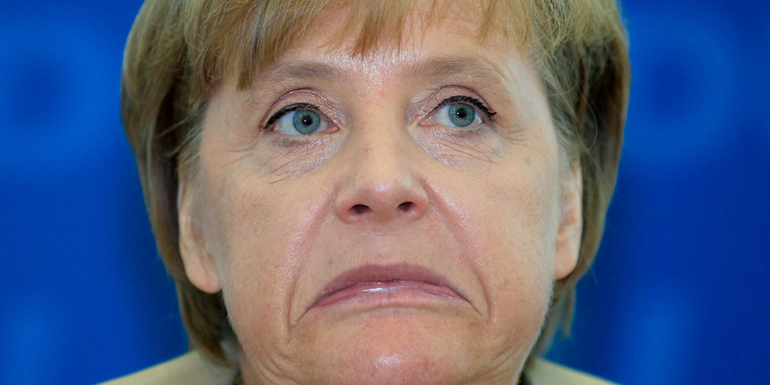 Merkel zieht eine Grimasse