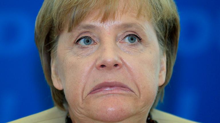 Merkel zieht eine Grimasse