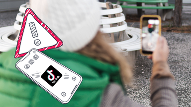 Ein Kind filmt auf dem Schulhof, Warnschild und Handy mit TIkTok-Logo