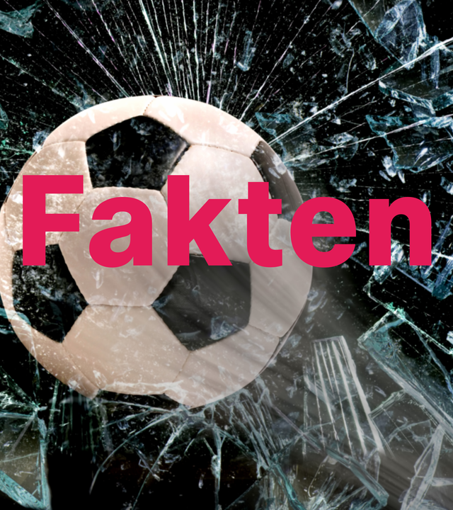 Ein Fußball wird in eine Scheibe geschossen. 