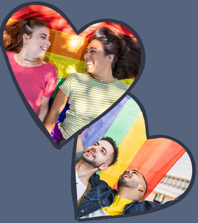 Zwei homosexuelle Pärchen mit Flaggen in Herzumrandung