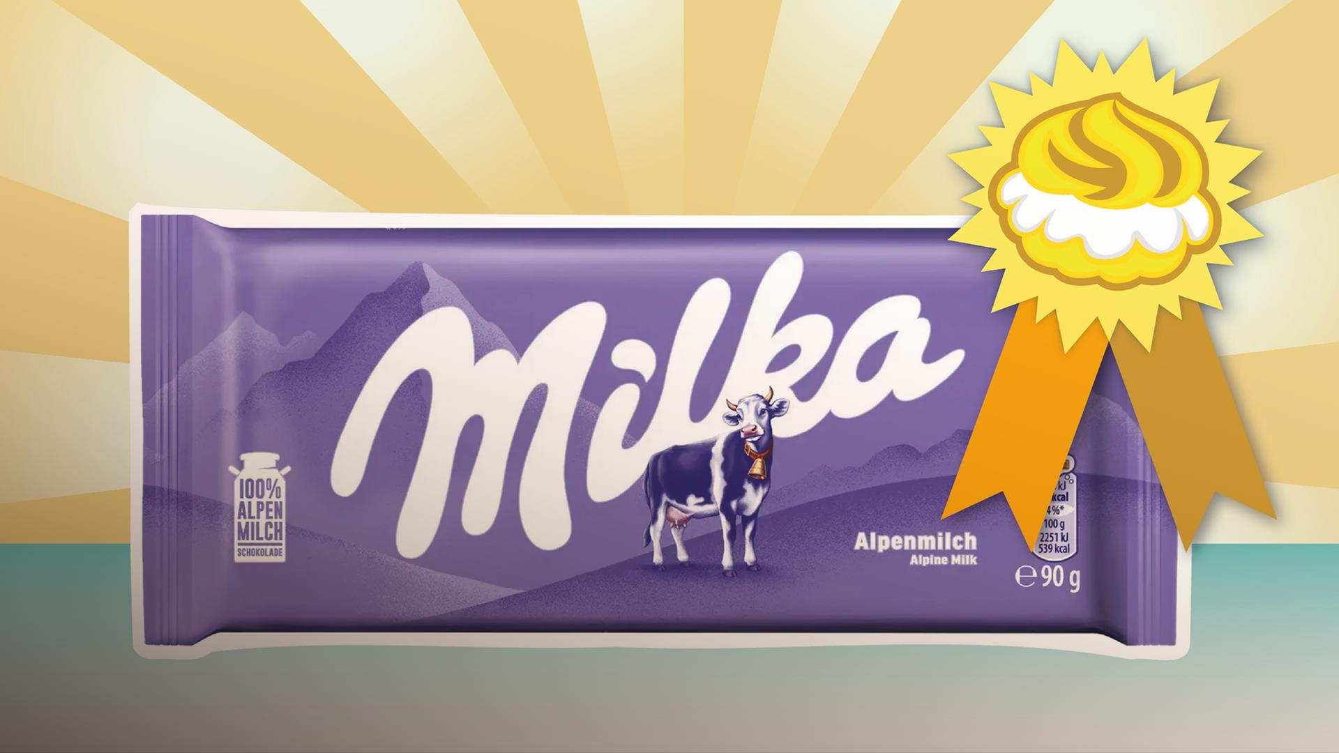 Tafel Milka-Schokolade, daran klebt Siegel mit Windbeutel, bunter Strahlenhintergrund