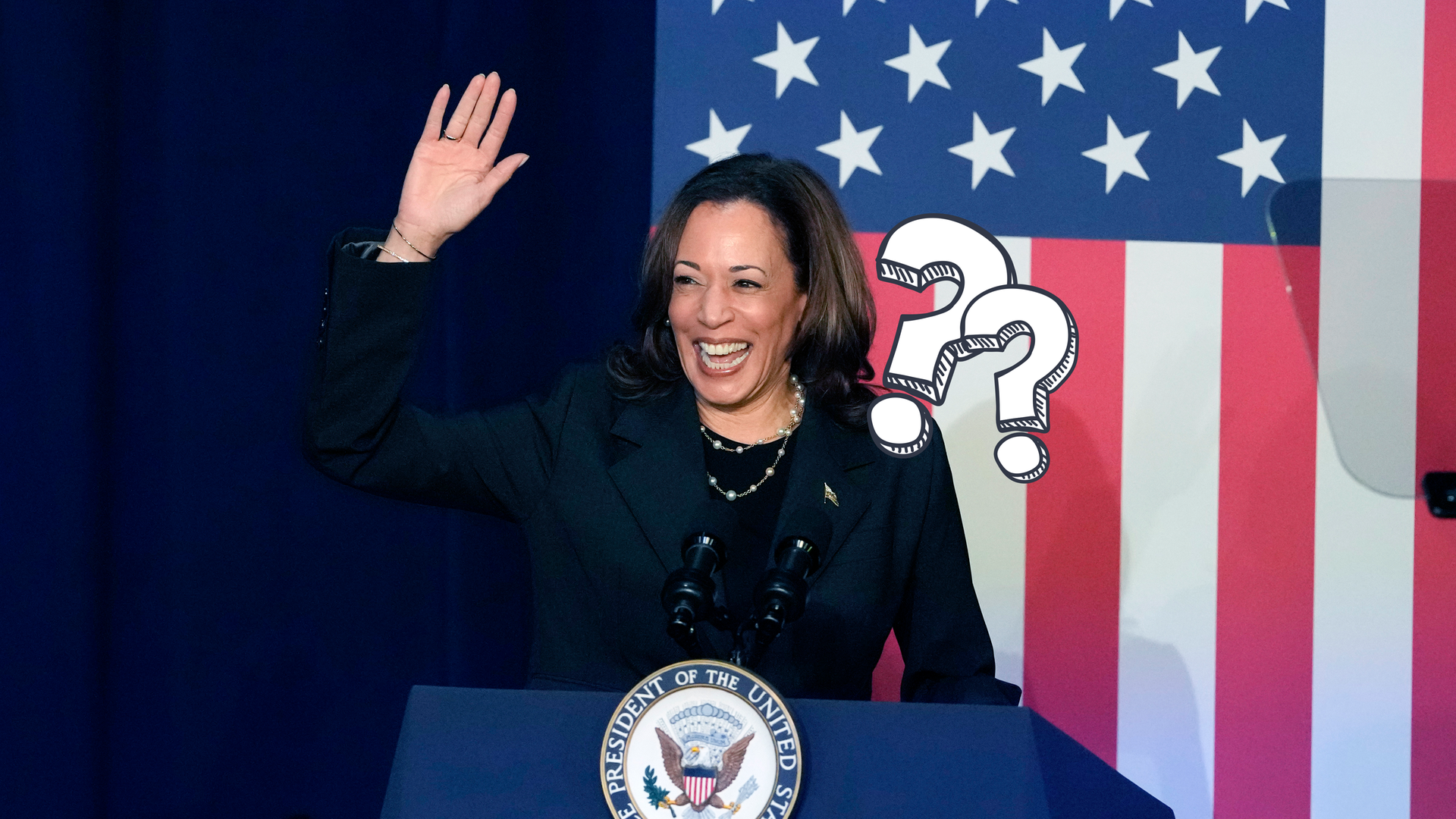 Kamala Harris winkt und lacht 