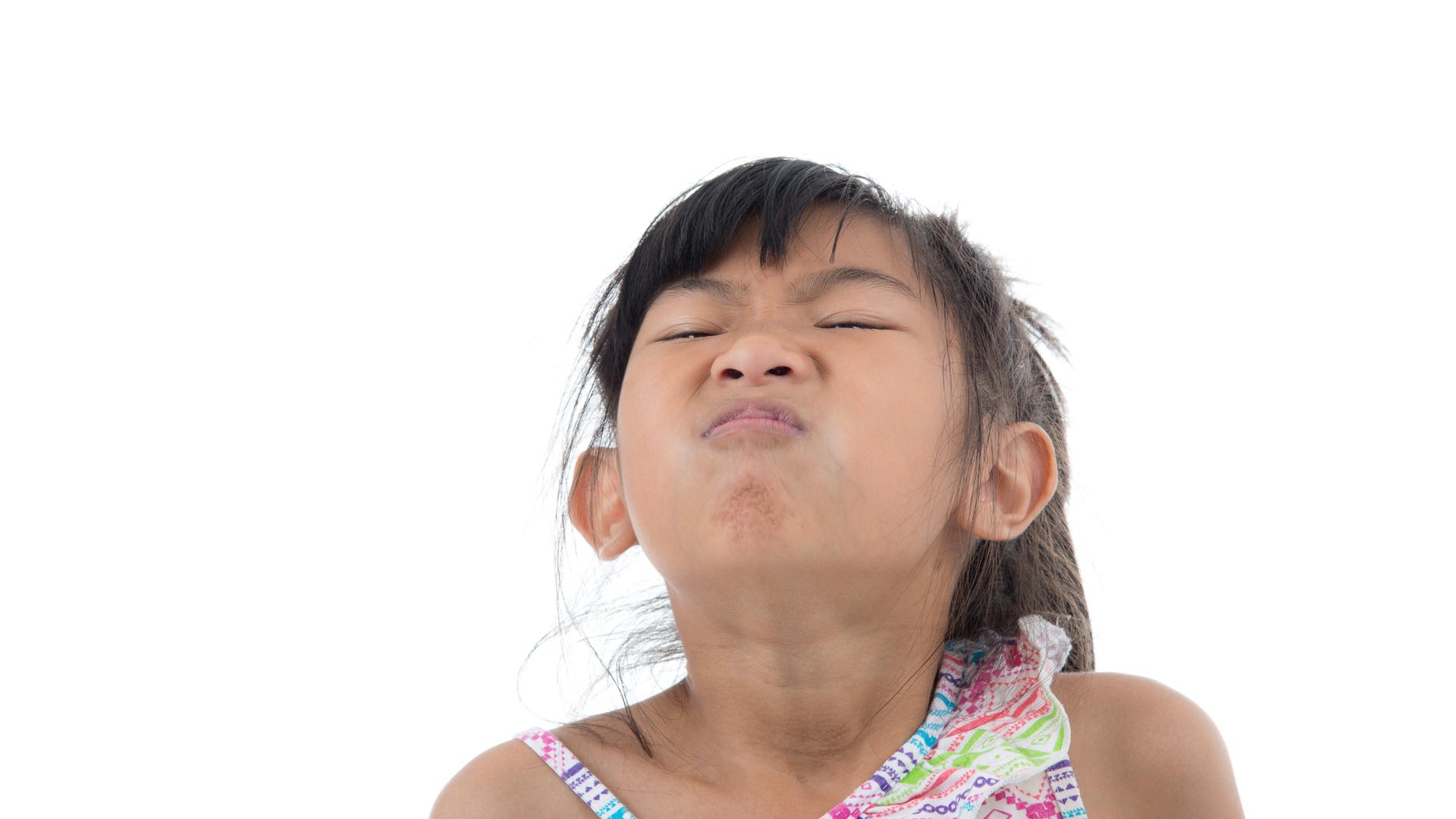 Kind rümpt die Nase