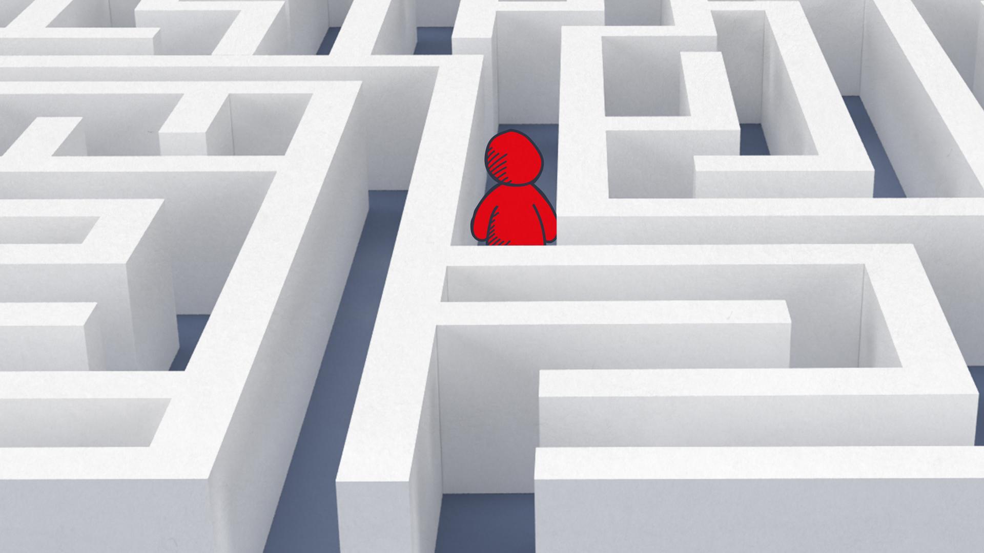 Rotes Doodlemännchen steht in Labyrinth