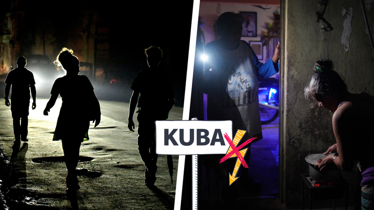 Eine Frau leuchtet mit einer Taschenlampe, während eine andere kocht.