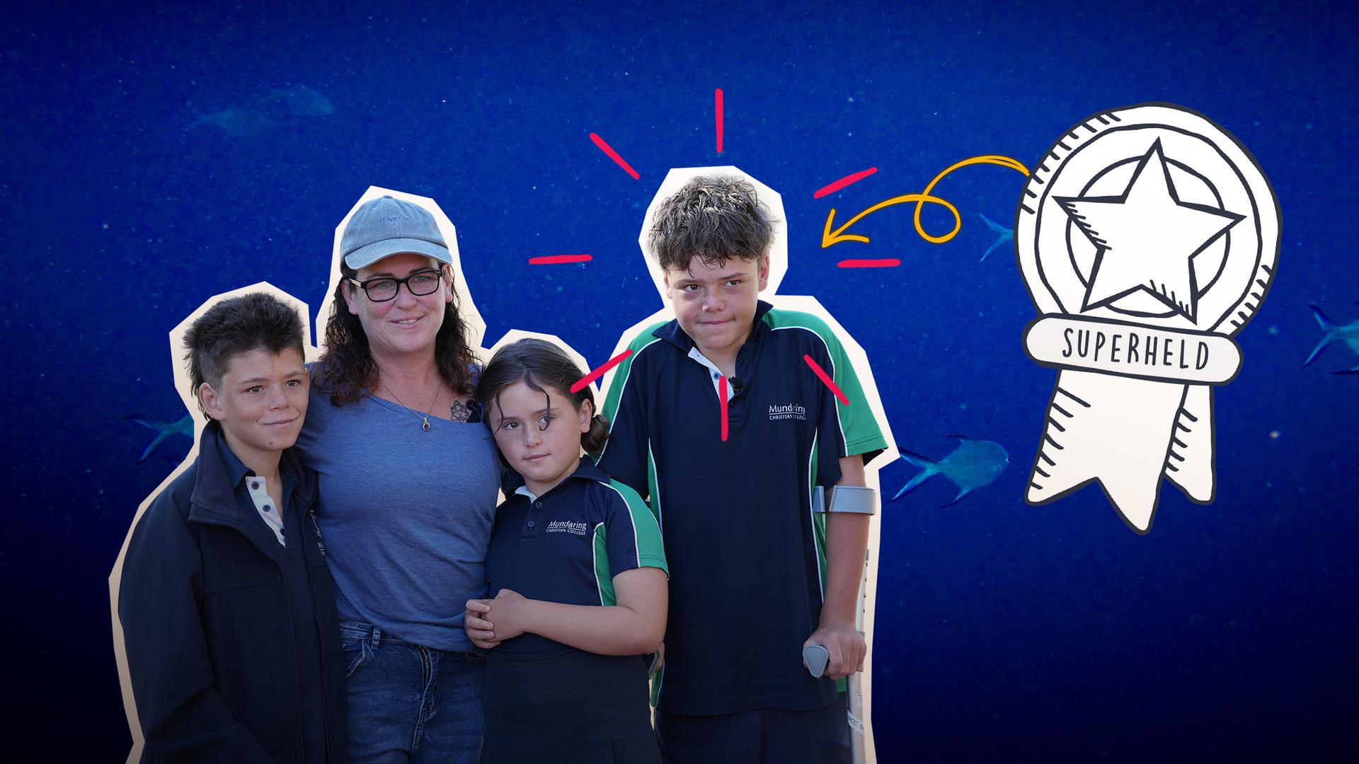 Austins Familie als Foto-Cutout, daneben Orden "Superheld"