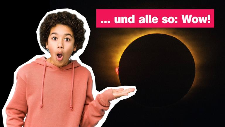 Ein Junge zeigt erstaunt auf eine Sonnenfinsternis.