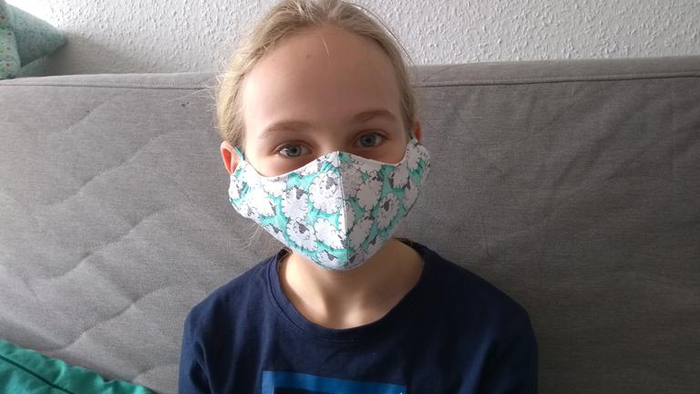 Aktion, bei der Kinder Fotos von sich mit ihren Masken an logo! schicken konnten.