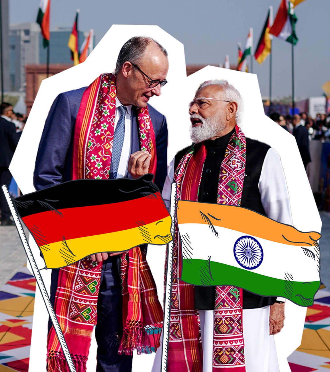 Merz und Modi stehen nebeneinander, auf ihnen eine Deutschlandflagge und eine Indienflagge
