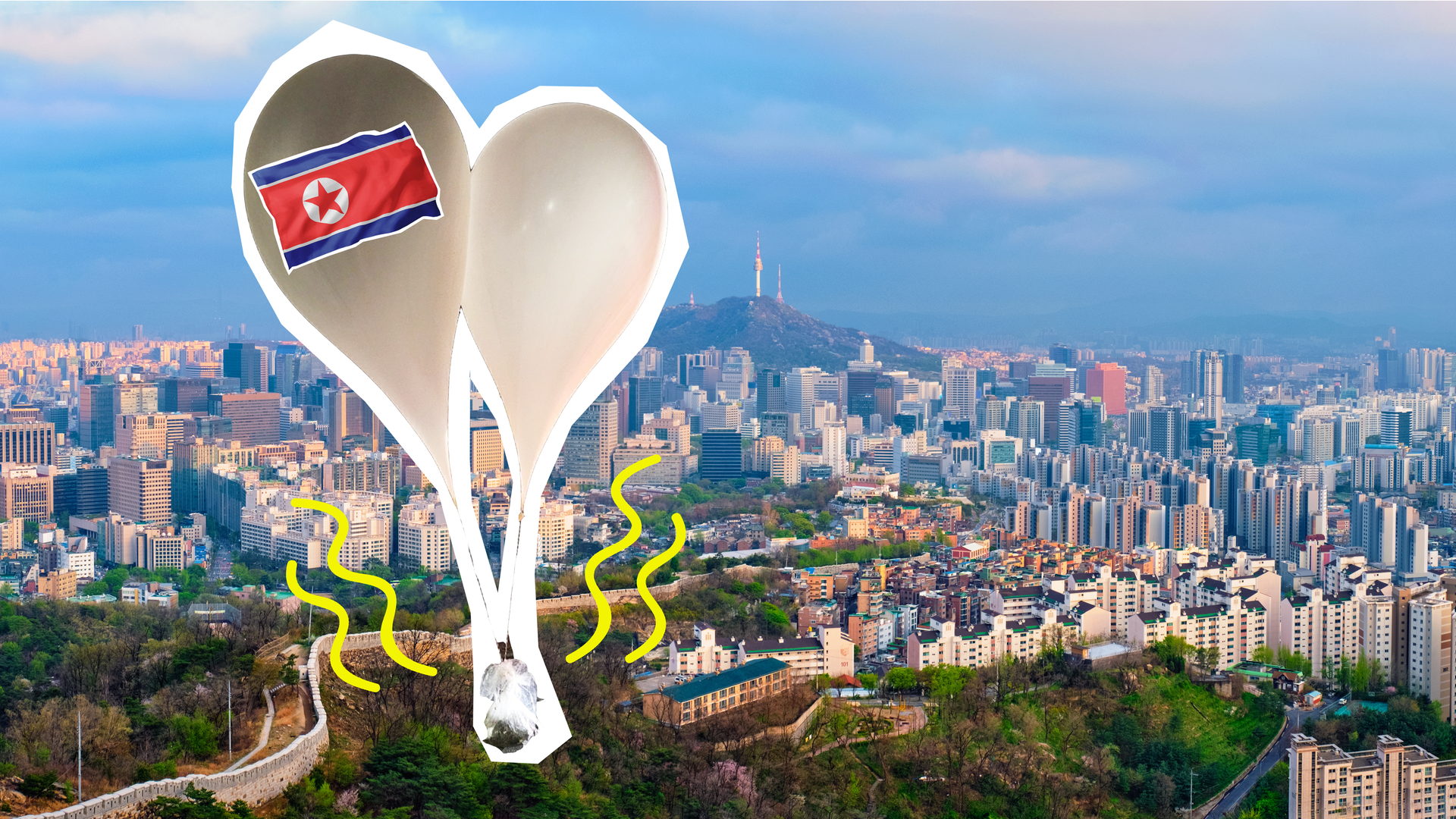 Abfallballons mit nordkoreanischer Flagge und im Hintergrund eine Sicht auf Seoul