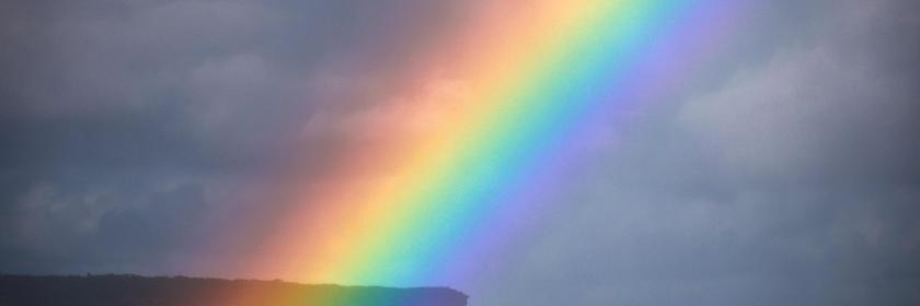 Regenbogen über Boot in Sydney