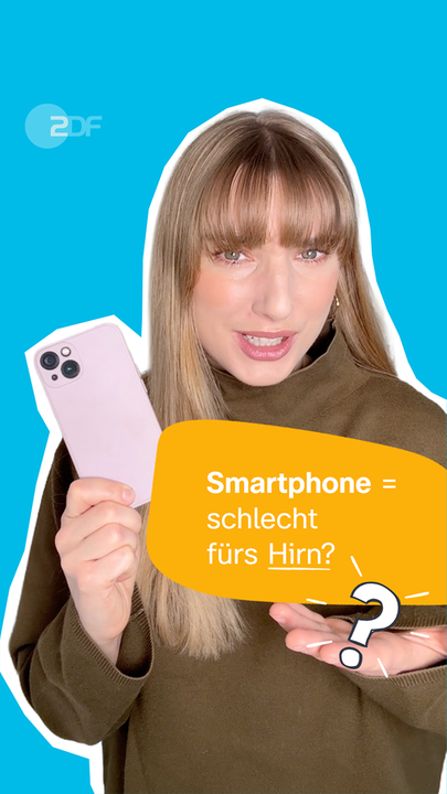 Eine blonde Frau vor neutralem Hintergrund ist zu sehen? Sie hält ein Handy in der Hand. Daneben ist die Sprechblase: "Smartphone = schlecht für's Hirn?"