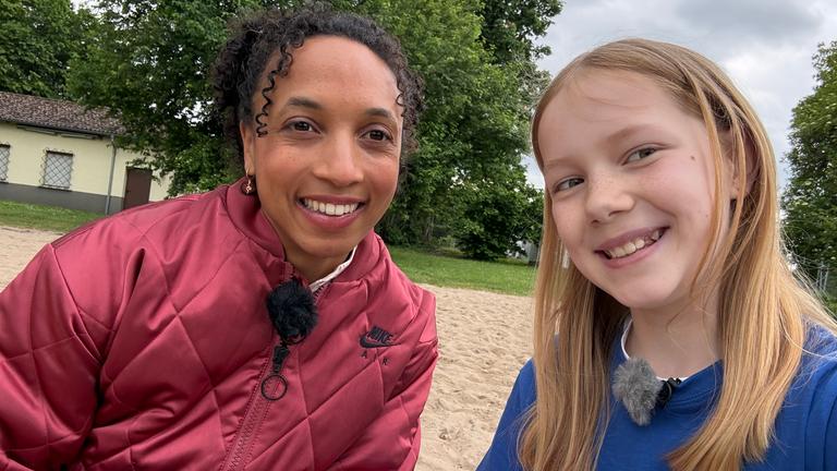 Kinderreporterin Thea mit Malaika Mihambo