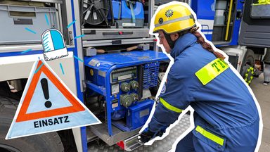 Eine Frau beim TEchnischen Hilfswerk, Einsatzschild und Blaulicht