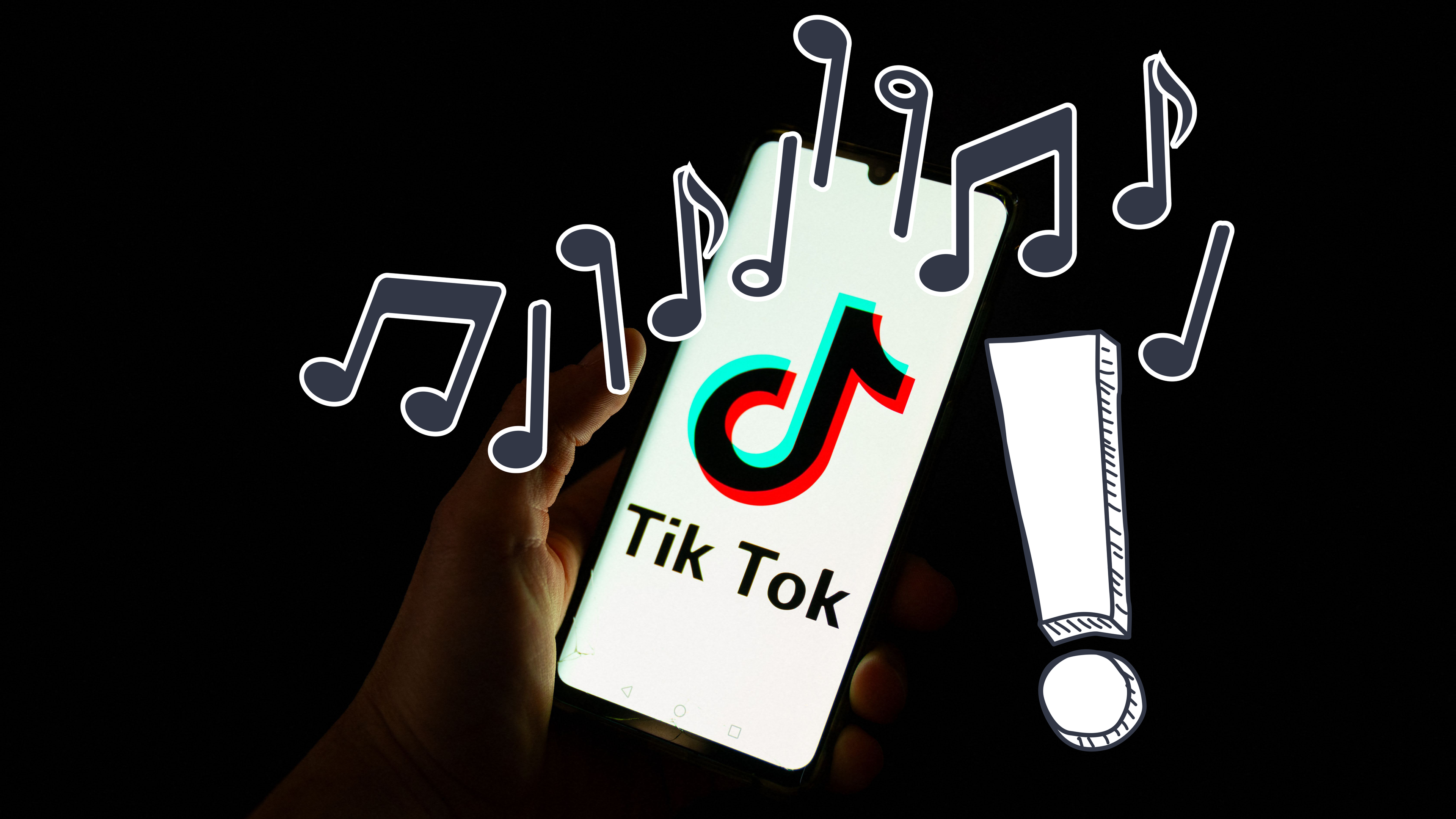 Logo von TikTok auf einem Handy mit Musiknoten und Ausrufezeichen