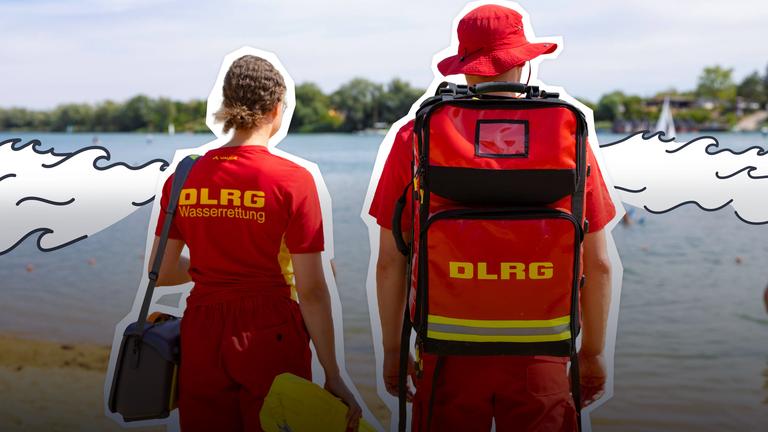 Zwei Personen mit DLRG-Ausrüstung stehen vor einem Badesee