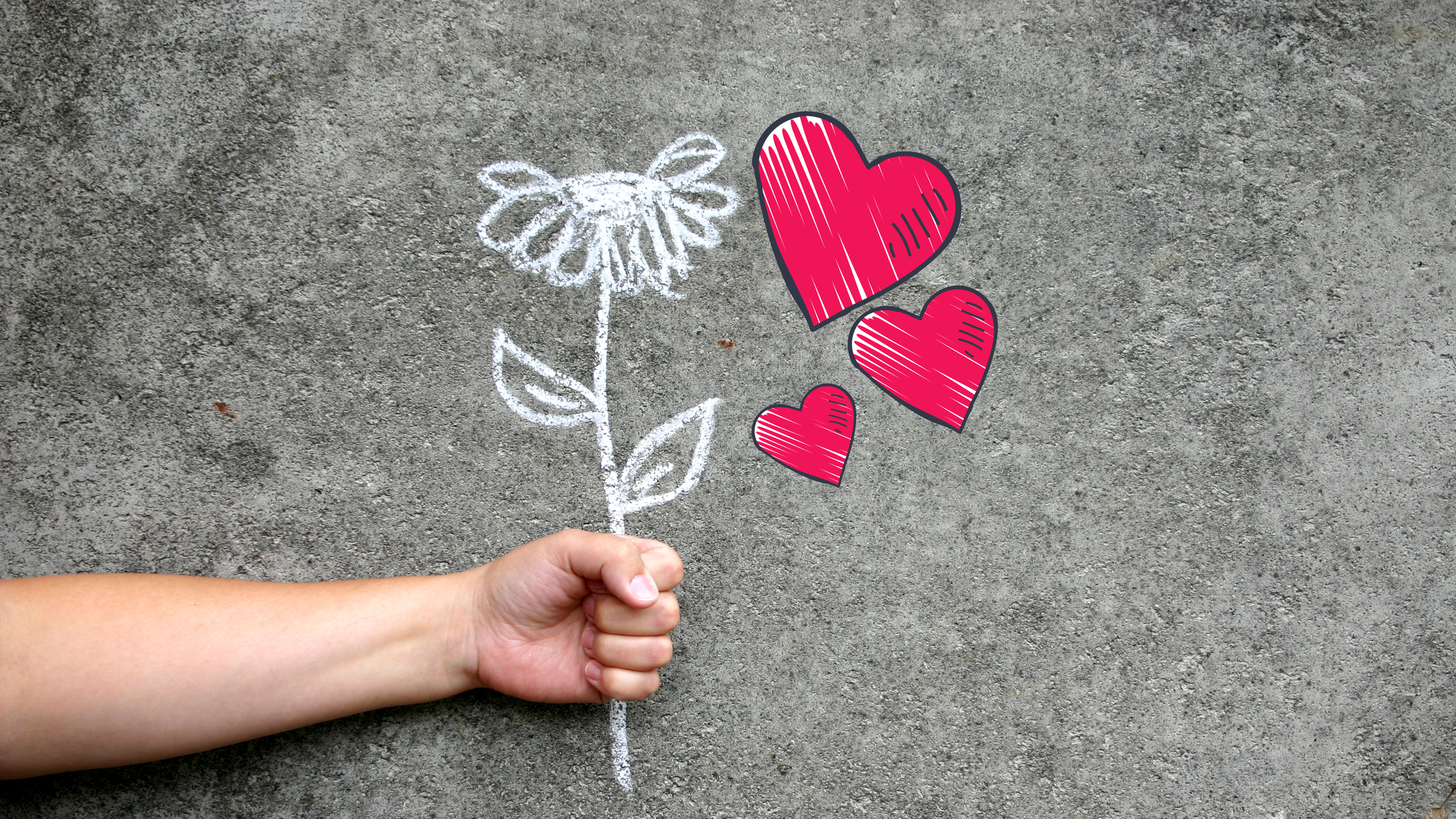 Valentinstag - Hand hält Blumen 